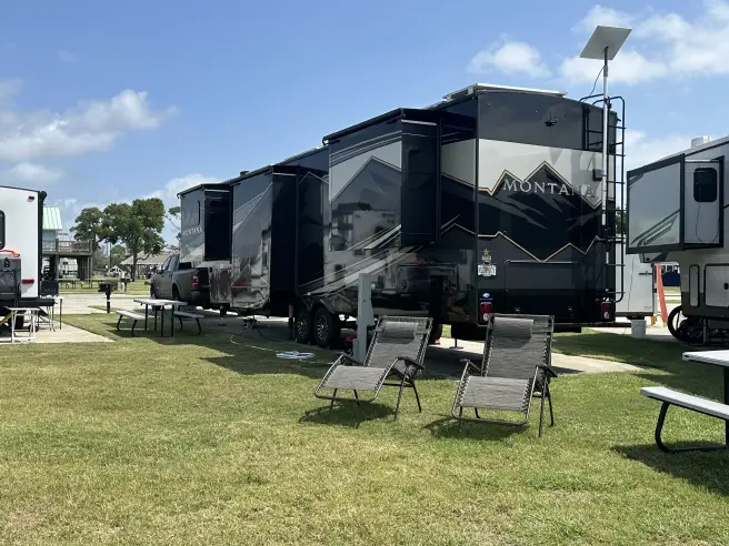 5th wheel and travel trailer on full-hookup sites at Two Rivers Campground